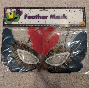 Colorful Feather Mask with Red and Blue Accents